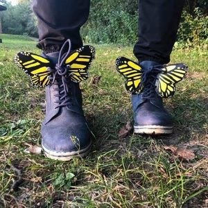 Pair of yellow butterfly’s for boots